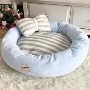 Round dog bed with pillow